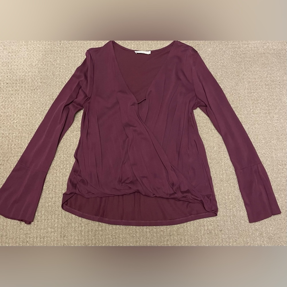 Gorgeous plum wrap top with bell long sleeves - size small - great condition